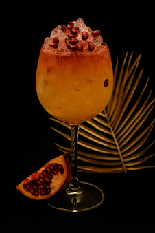 Cocktail signature orangé à la grenade